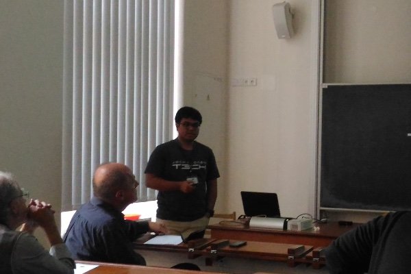 Presenting his research to a seminar room in Prague, Czech Republic